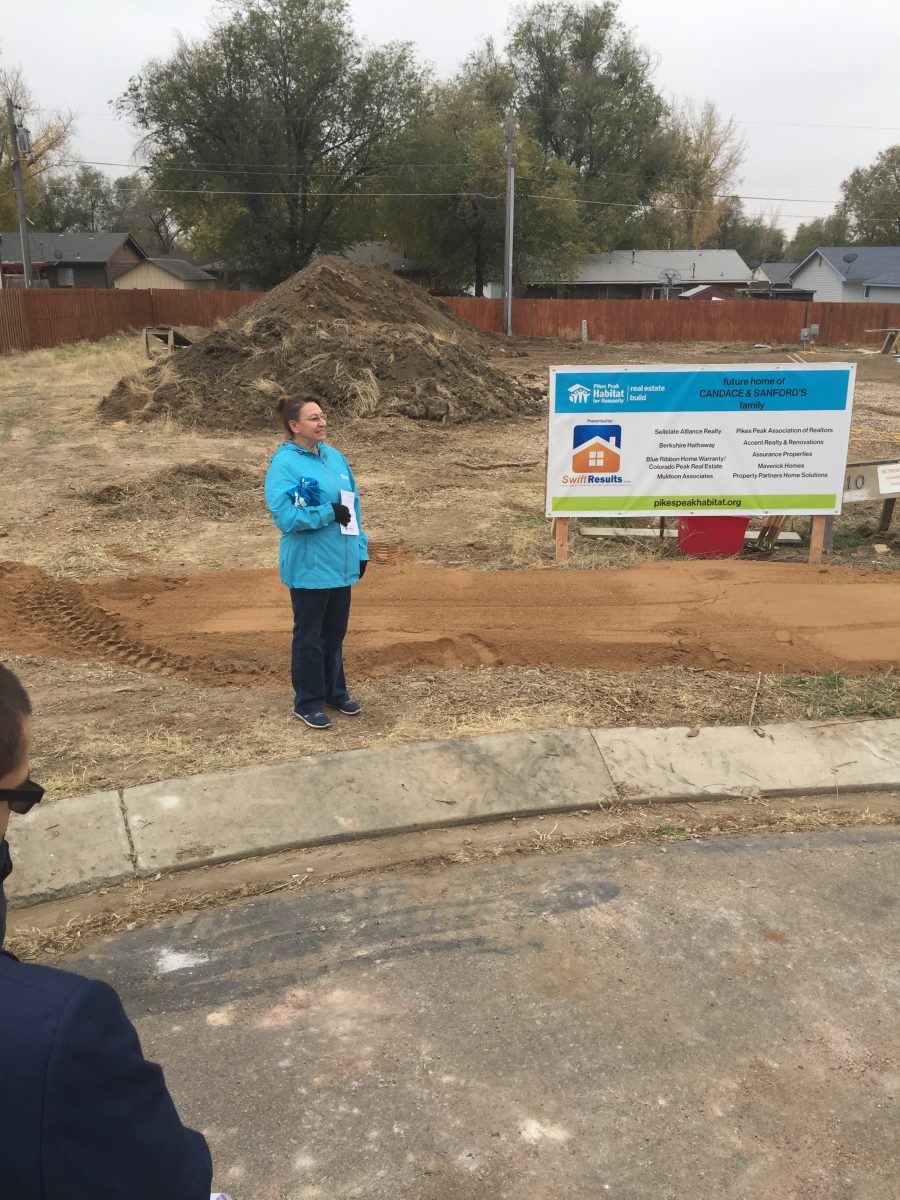 Janet talks to the crowd at the ground blessing for the Pikes Peak Habitat Real Estate Build.