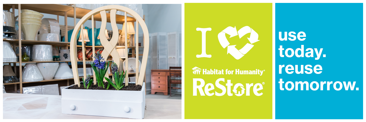 Upcycled planter made from drawer and chair back, with I love the ReStore logo and wording "use today, reuse tomorrow"