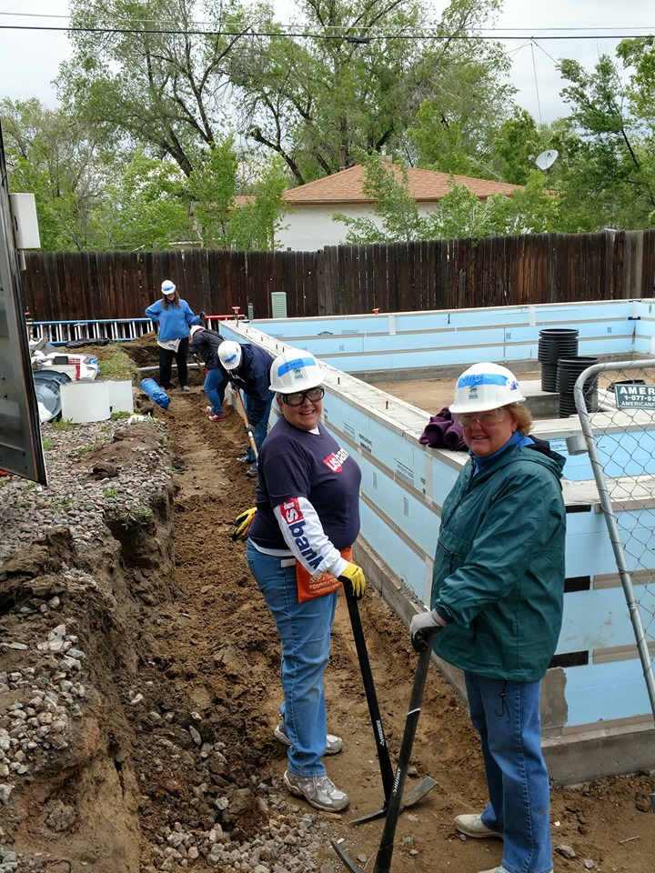 US Bank volunteers working on foundation