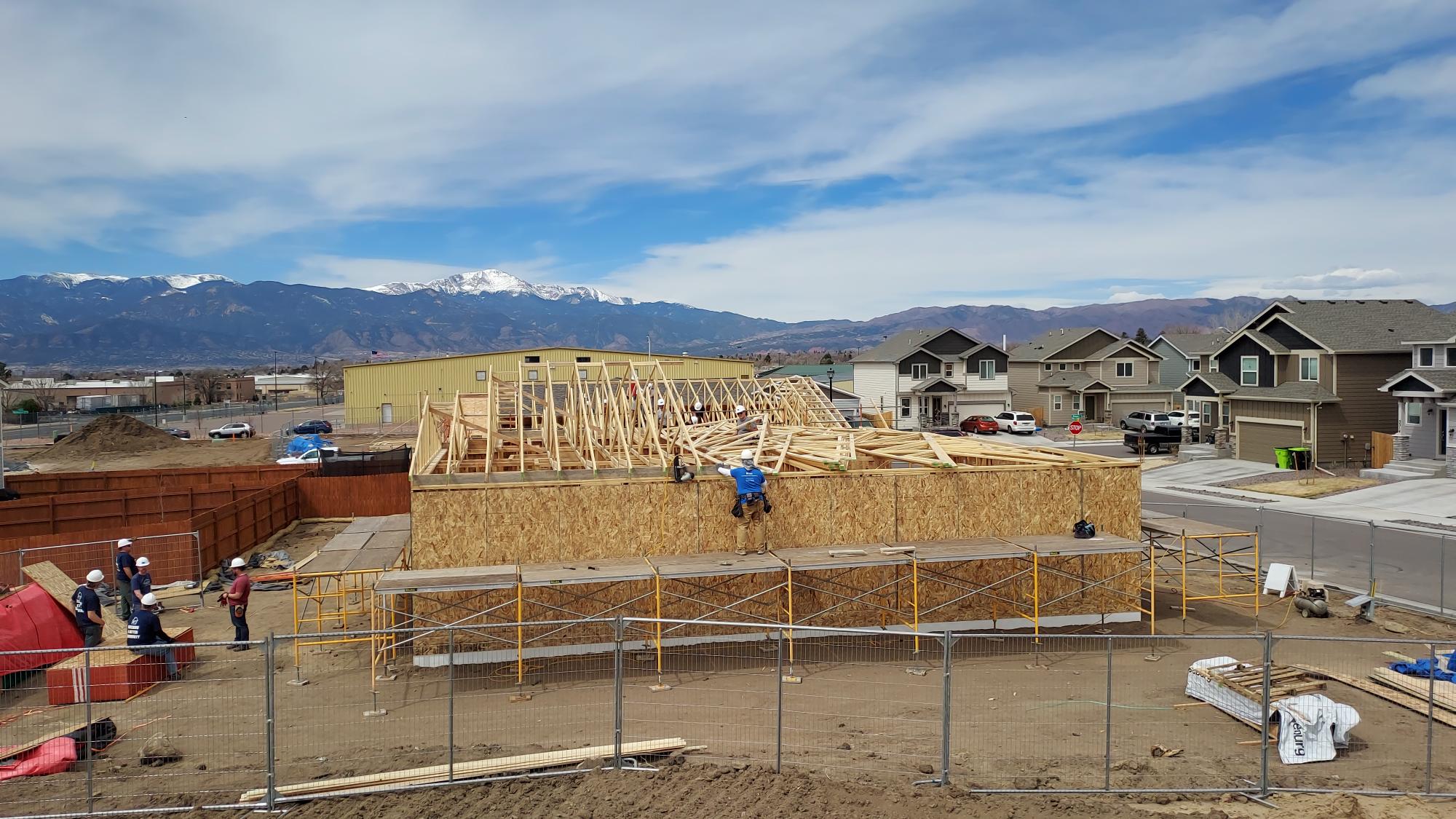 Standing trusses and putting on roof deck