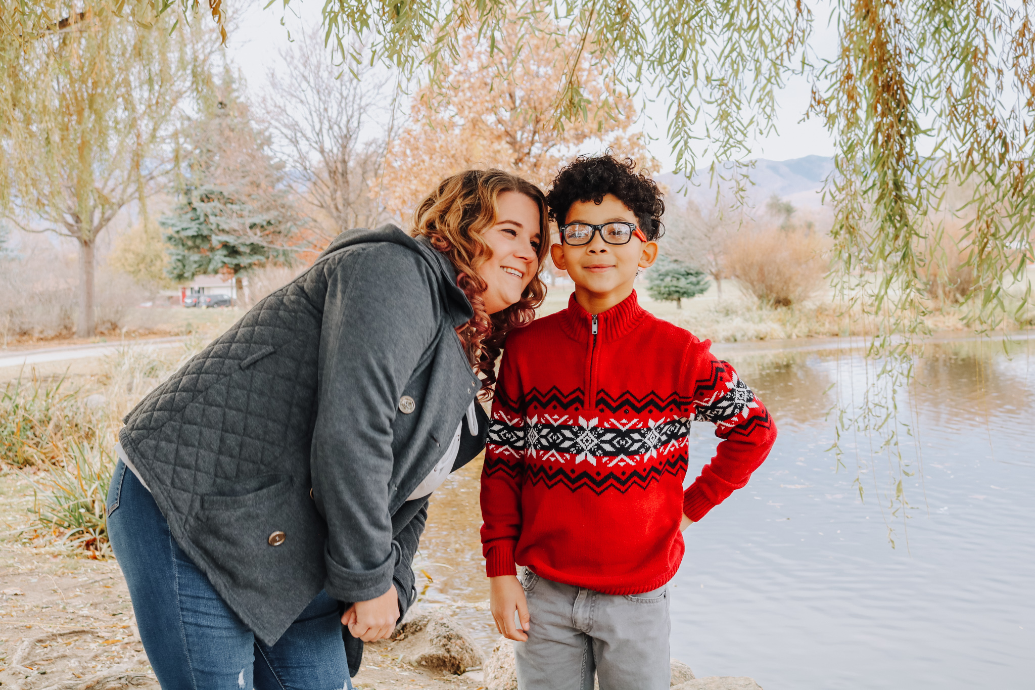Mom and son in front of lake