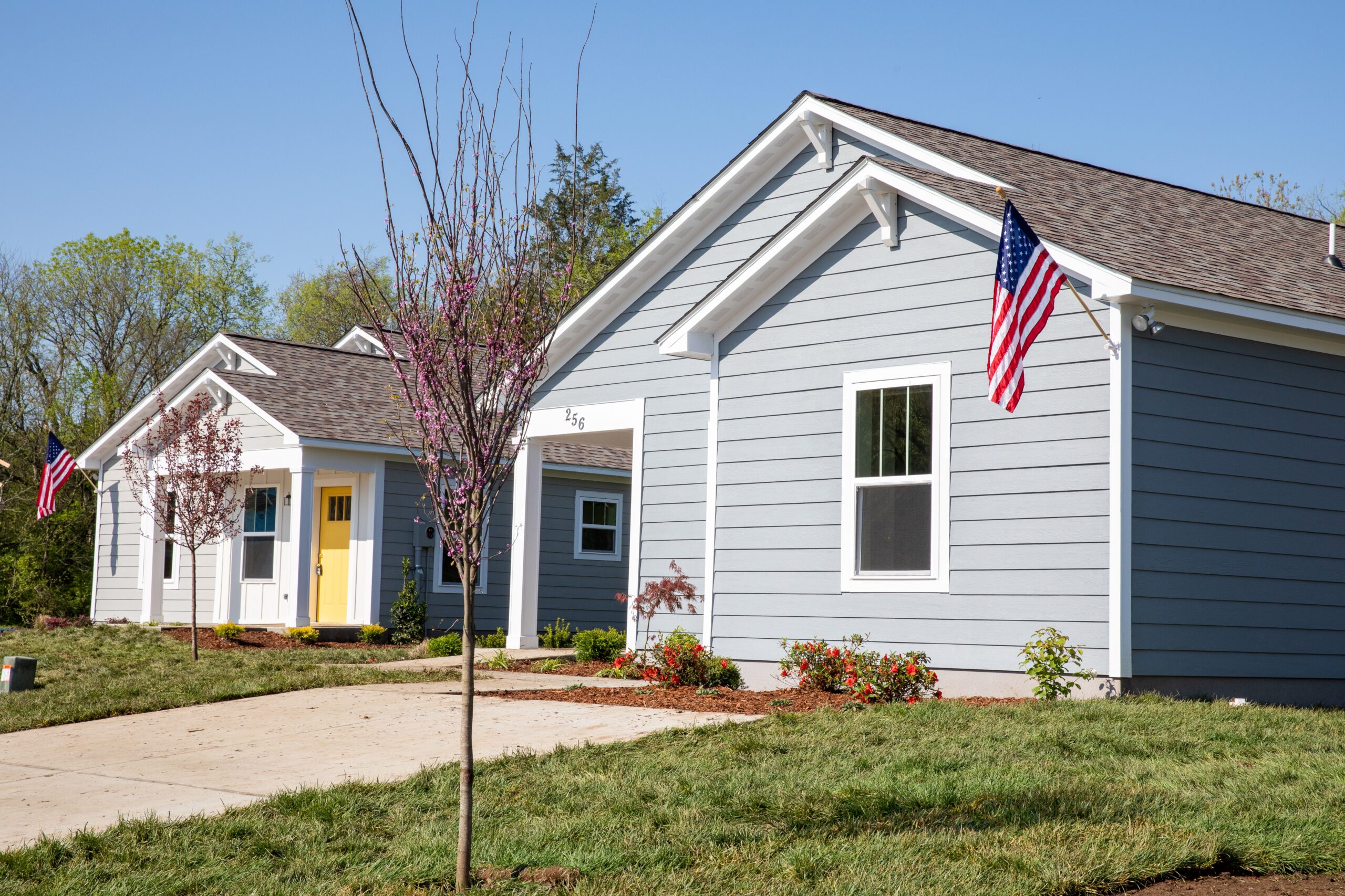 Habitat homes with an American flag flying