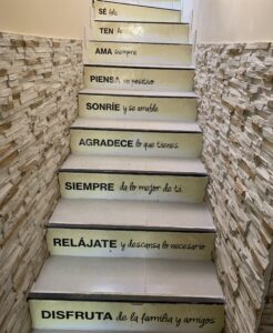 Staircase with words written in Spanish on each step