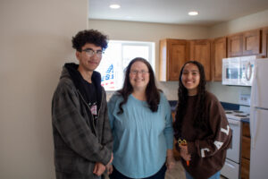 Kayla's family in their new kitchen