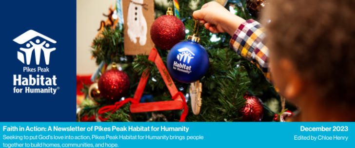 Header showing hand hanging ornament on Christmas tree