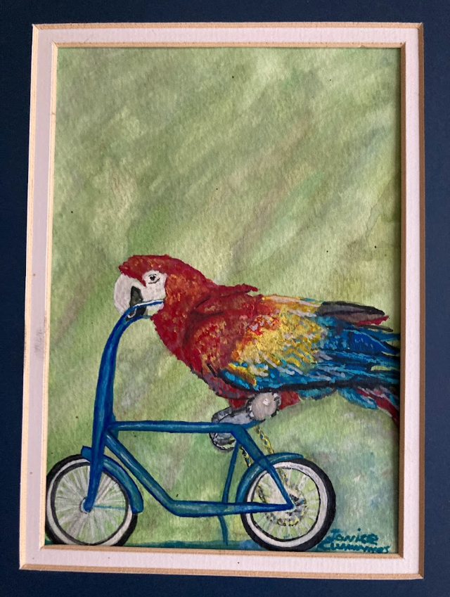 Painting of a parrot with a bicycle