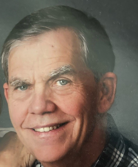 Headshot of smiling man