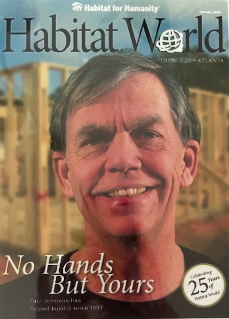 Magazine cover with photo of Paul Johnson