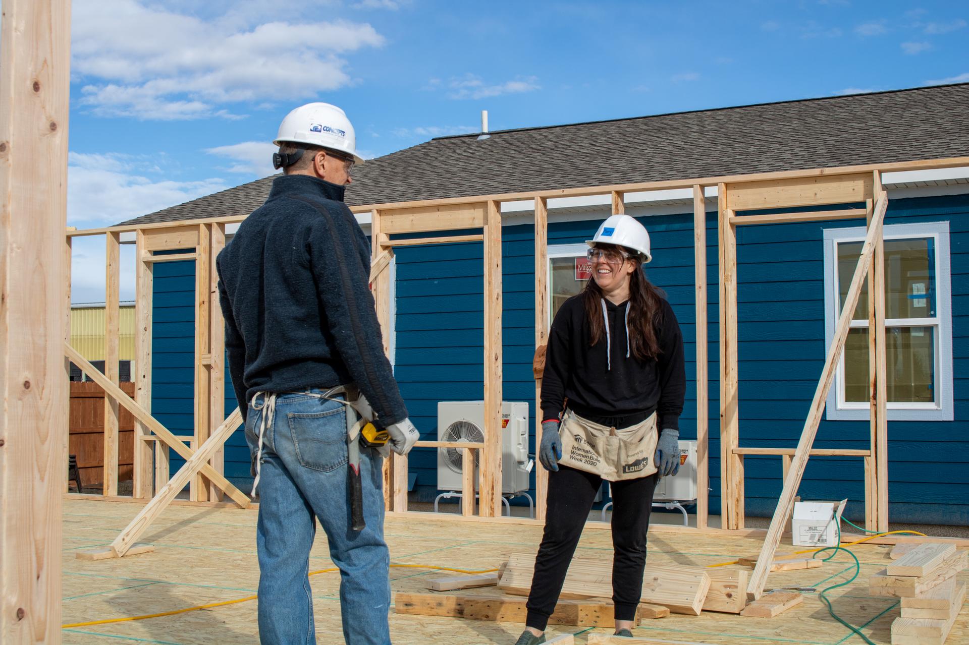 People in hard hats on job site