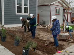 Volunteers landscaping yard