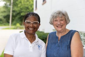 Two women smiling