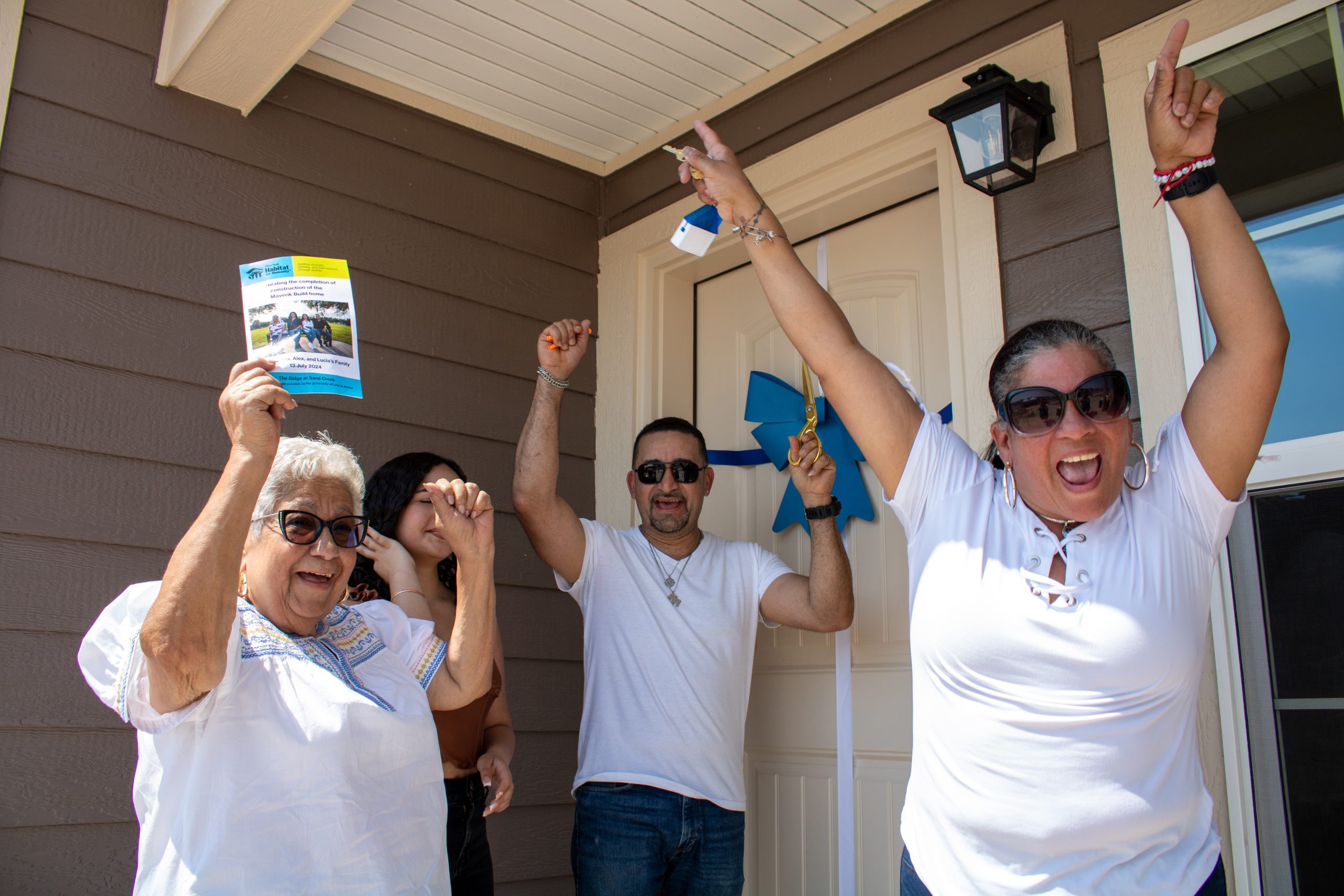 Smiling child in front of Christmas tree